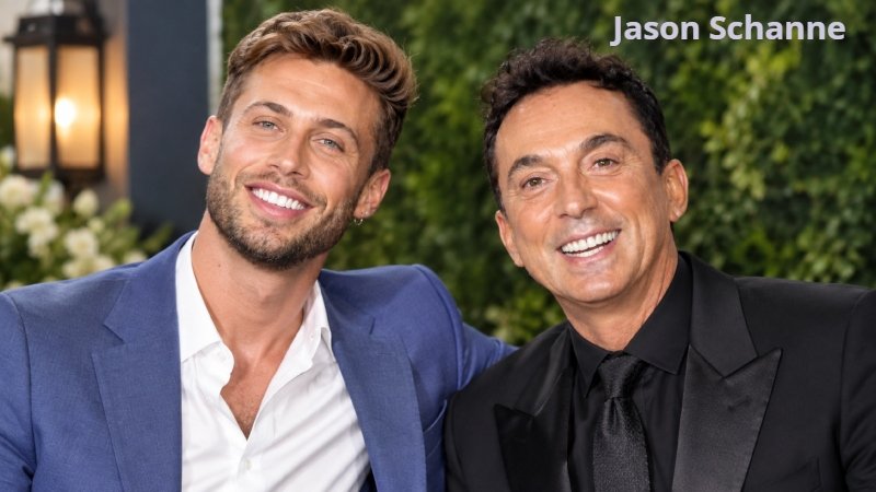 Two men smiling together at a formal evening event